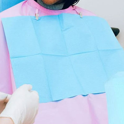 DISPOSABLE ADULT BIBS